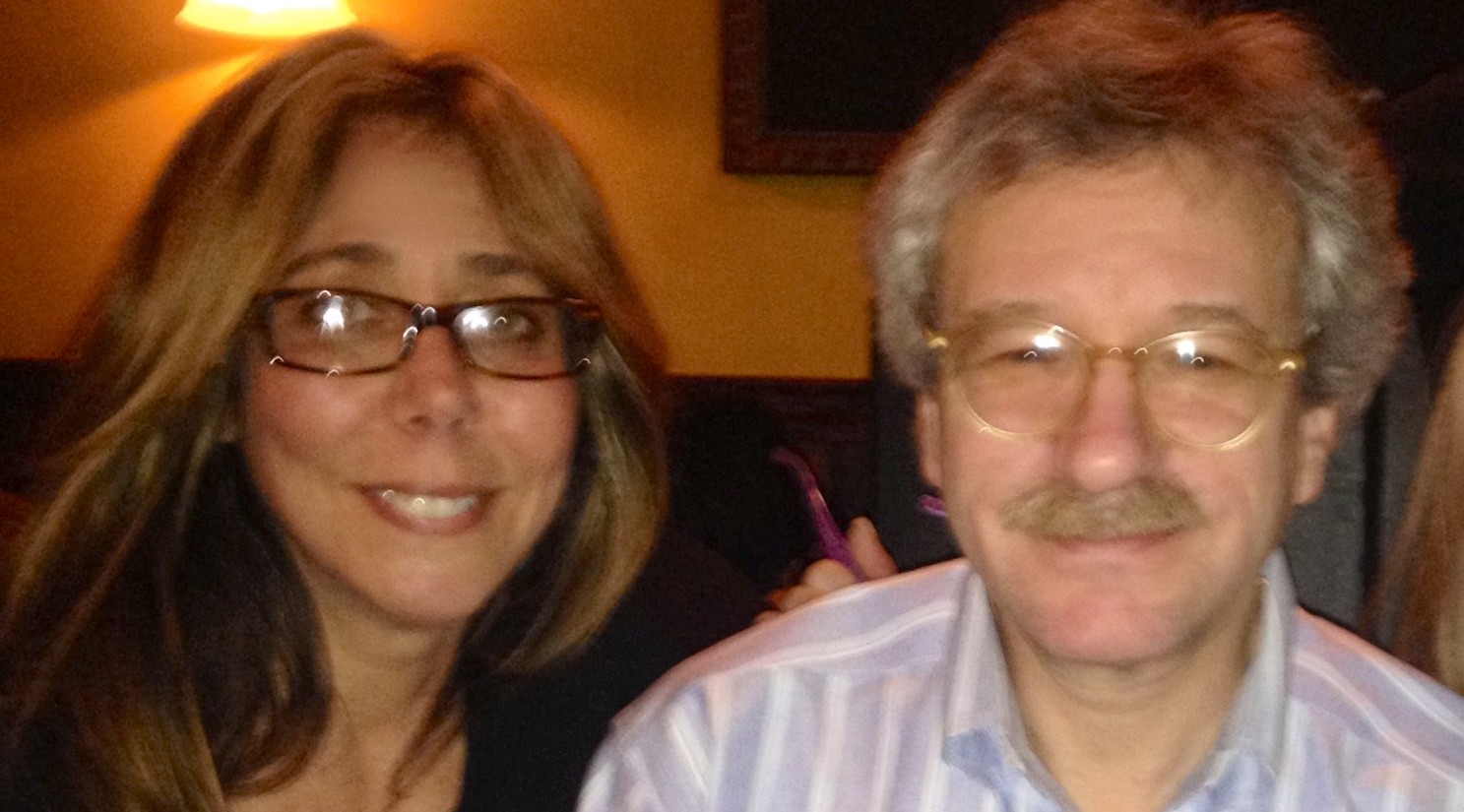 Jill and Gary posing together.