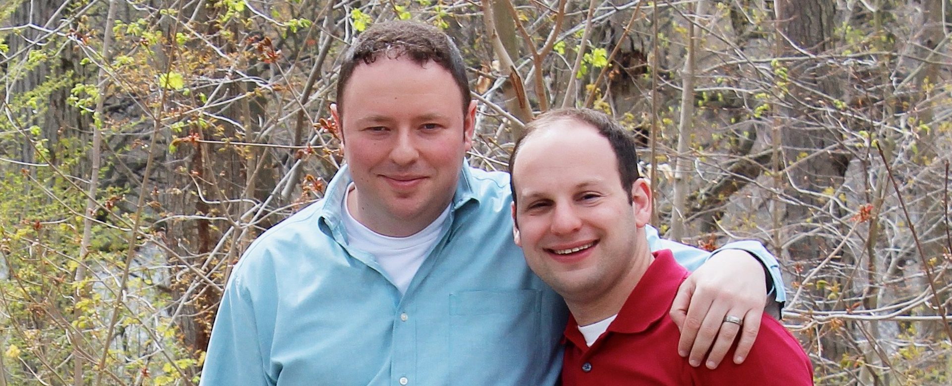 Matthew and Barry posing together outside.