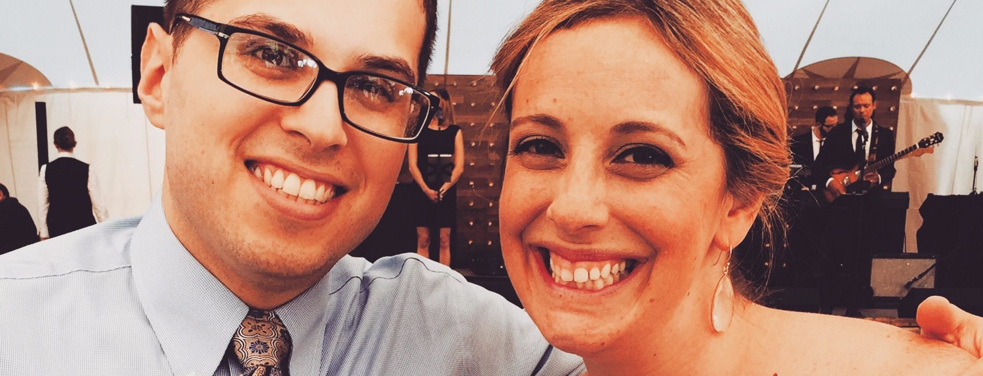 Jaclyn and Greg smiling on their wedding day