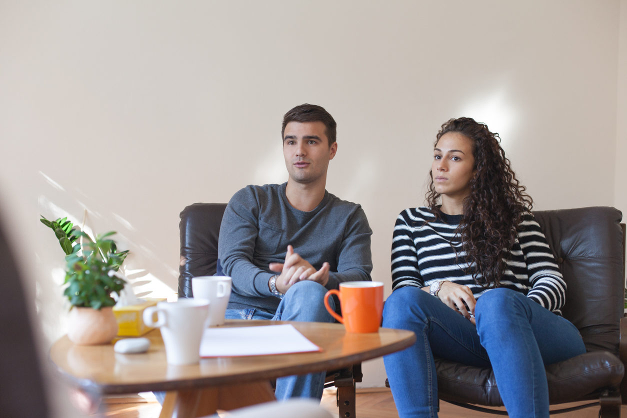 Couple who are sitting in therapy.