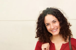 Single Jewish woman smiling at the camera